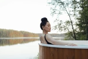 A Woman in an Outdoor Jacuzzi